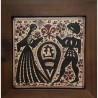 Ceramic tile decorated with a pair socarrat. medieval art. handmade
